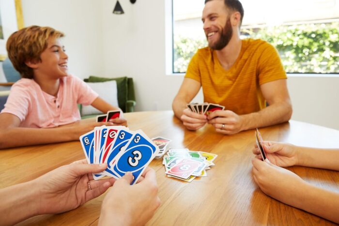 Mattel Games UNO, Classic Card Game for Kids and Adults for Family Game Night, Use as a Travel Game or Engaging Gift for Kids, 2 to 10 Players, Ages 7 and Up, W2087 - Image 4